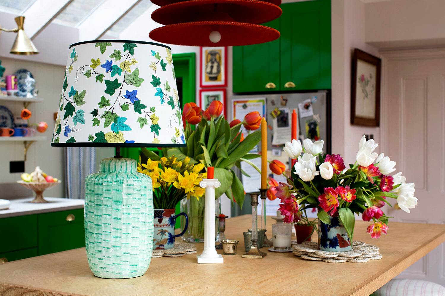 Rosi de Ruig botanical paper lampshade in her colourful kitchen for House & Gardens